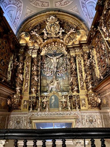 Opulent chapel with intricate altar depicting crucifixion of Christ in the Igreja de Sao Roque in Lisbon, Portuga.