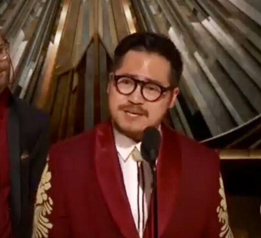 Screen grab of Daniel Kwan, winner for Best Director at the 2023 Oscars.