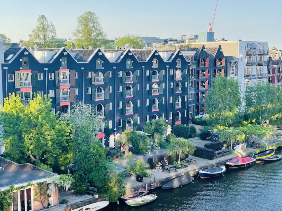 Converted Amsterdam canal warehouses to hip residential apartments.