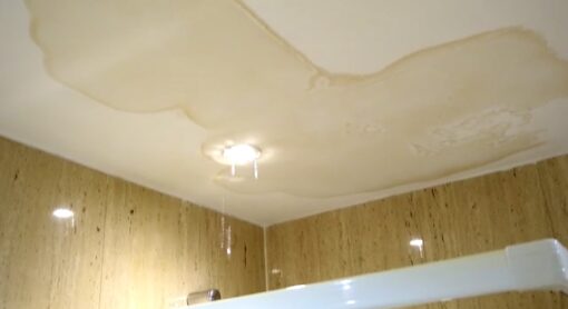 Water leaking from bathroom ceiling. 