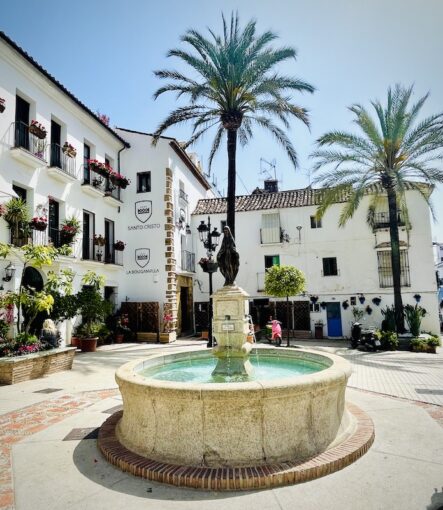 Fountain in the charming old town of Marbella in a residential square.