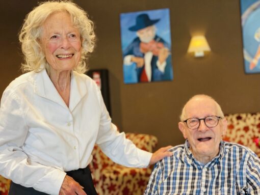 An elderly woman and man in their 90's brimming with health and looking happy.