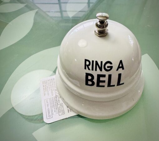 A service bell on a table.