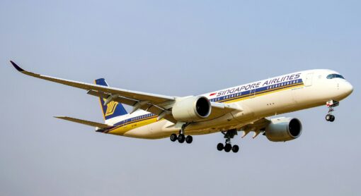 Singapore Airlines plane in mid-air ascending after take off in the sky.